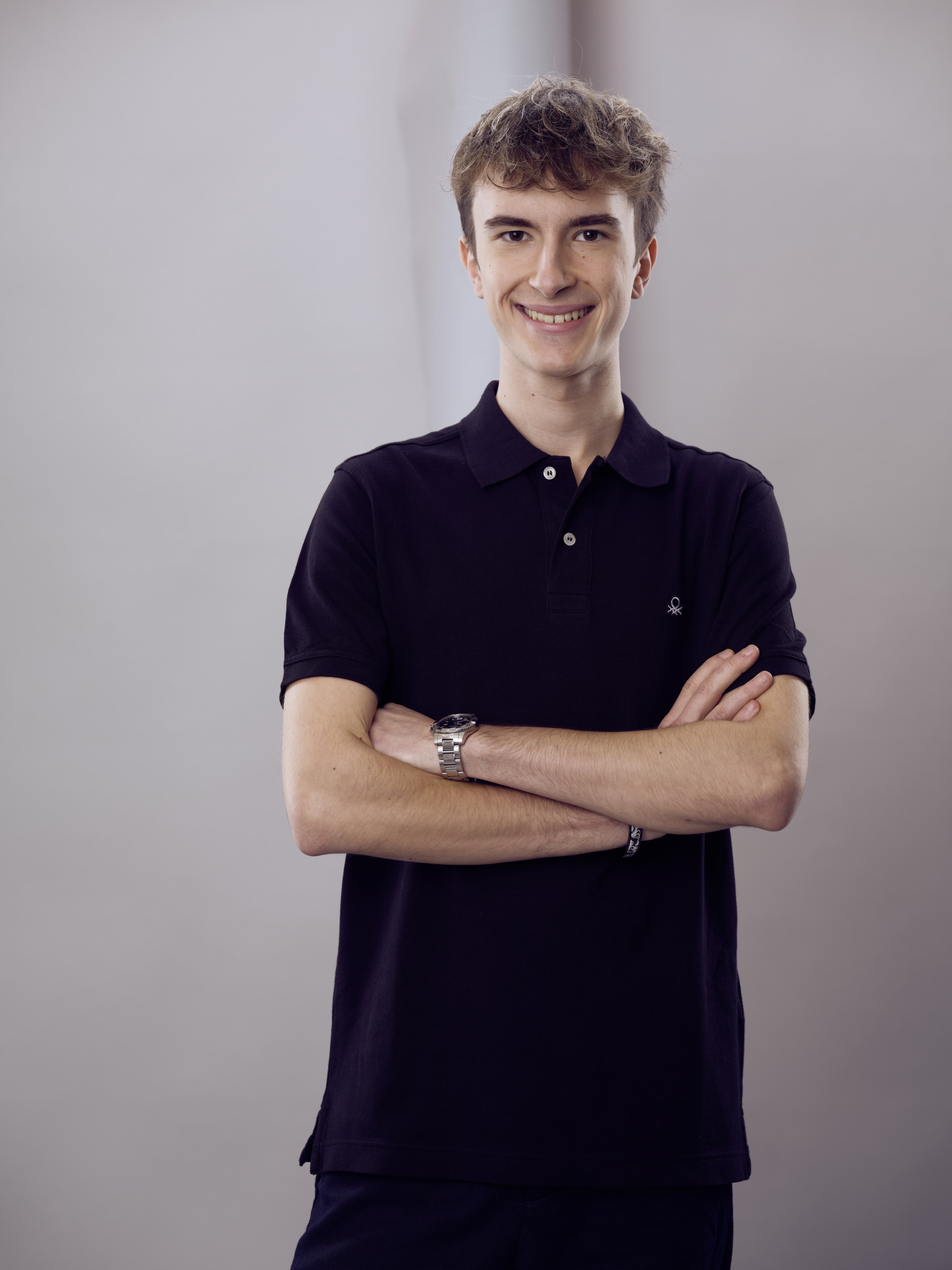 Professional portrait of Alex Chen in modern dark setting